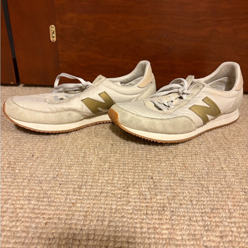 New Balance Beige and Gold Athletic Shoes